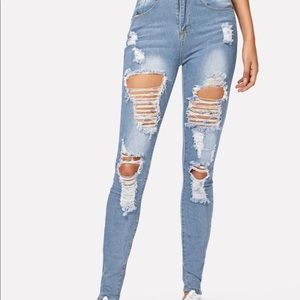 Light wash distressed skinny jeans